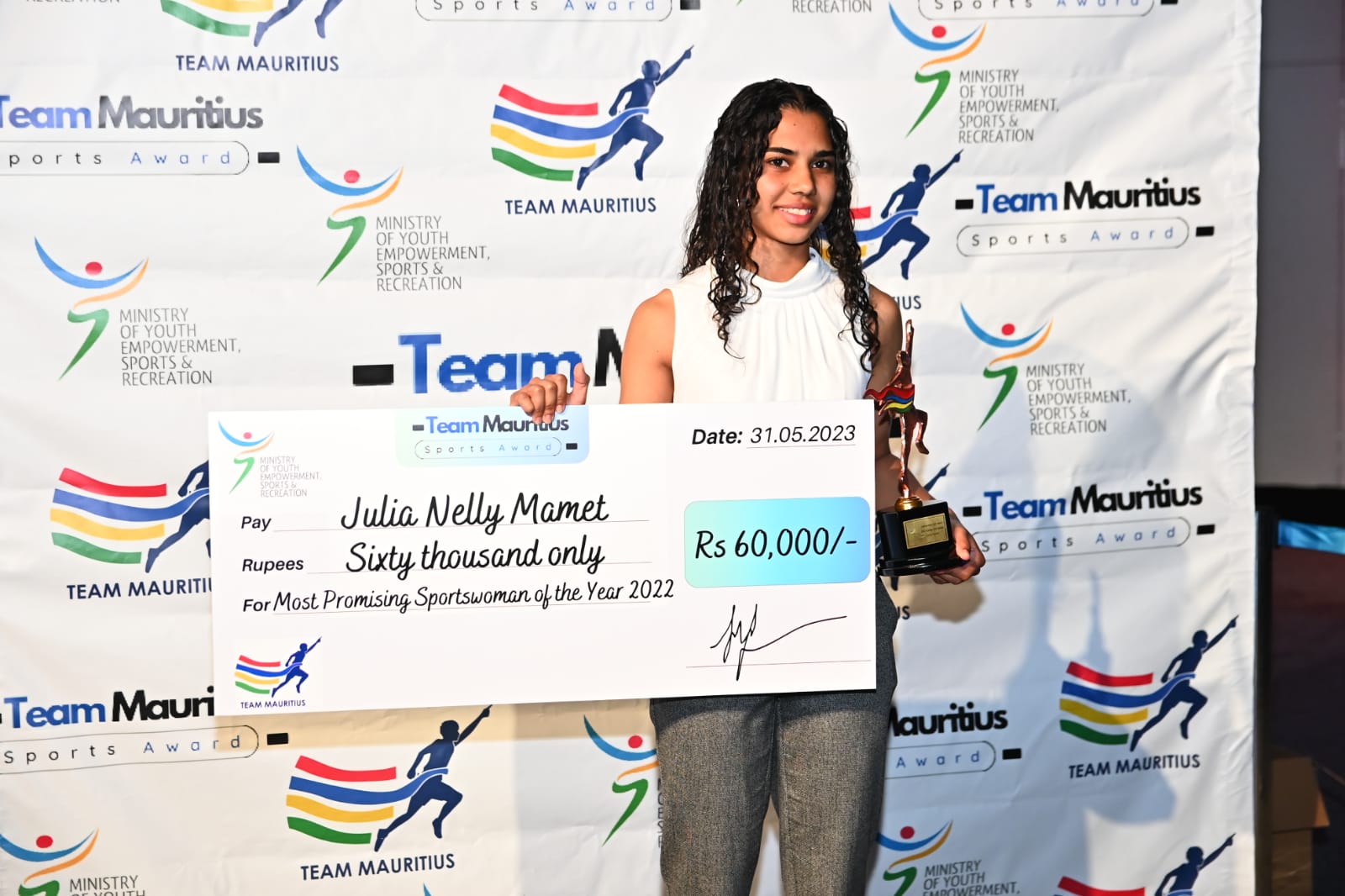 Nelly Mamat Receives Highest Recognition photo